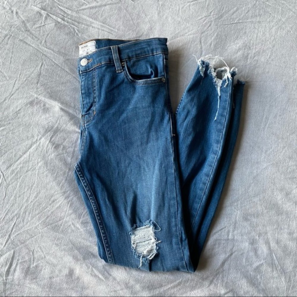 Free People, distressed skinny jeans with shark bite raw hem, size 2/26